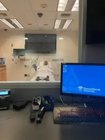 View of simulation room from the control room. 