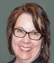 Headshot of woman with short dark hair