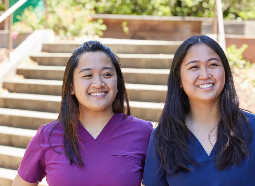 Two students outside on the SMU Oakland Campus