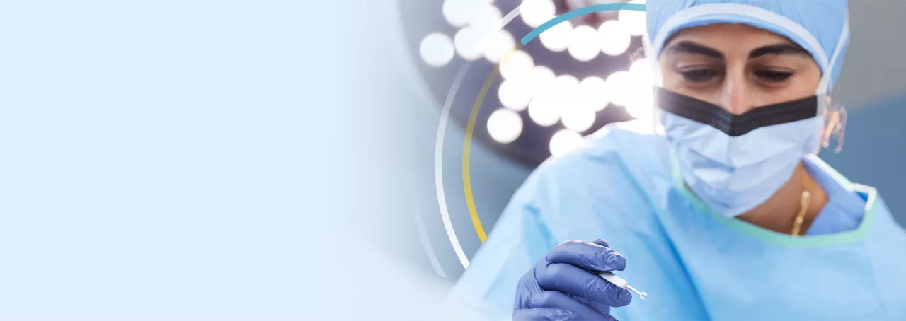 Podiatric surgeon working during a procedure.