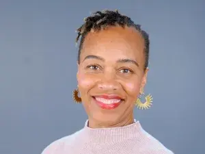 Woman in pink sweater