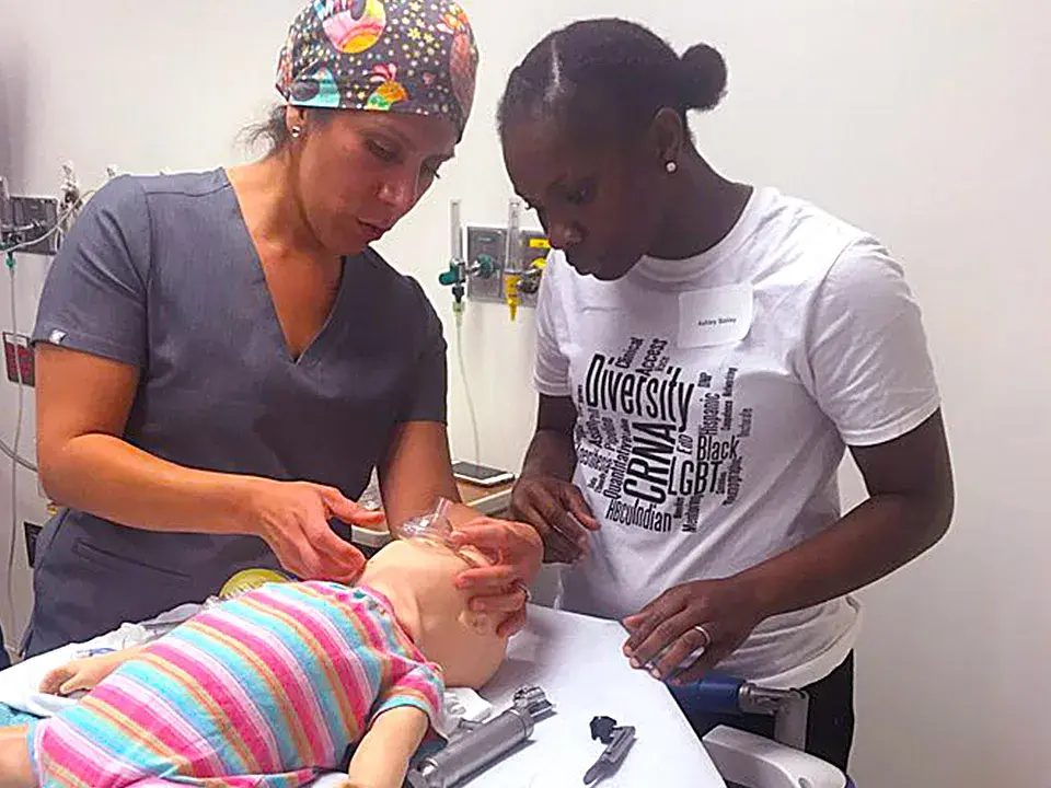 Ana Armenta, CRNA '16 (left)