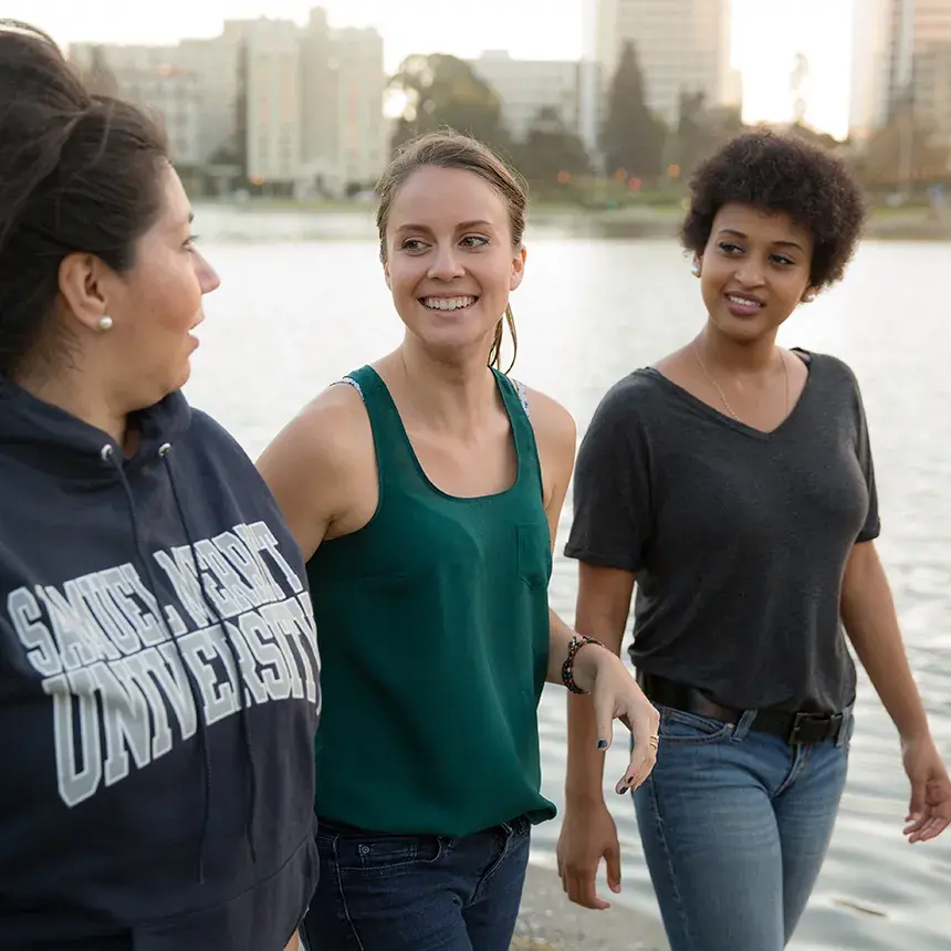 Three females walking