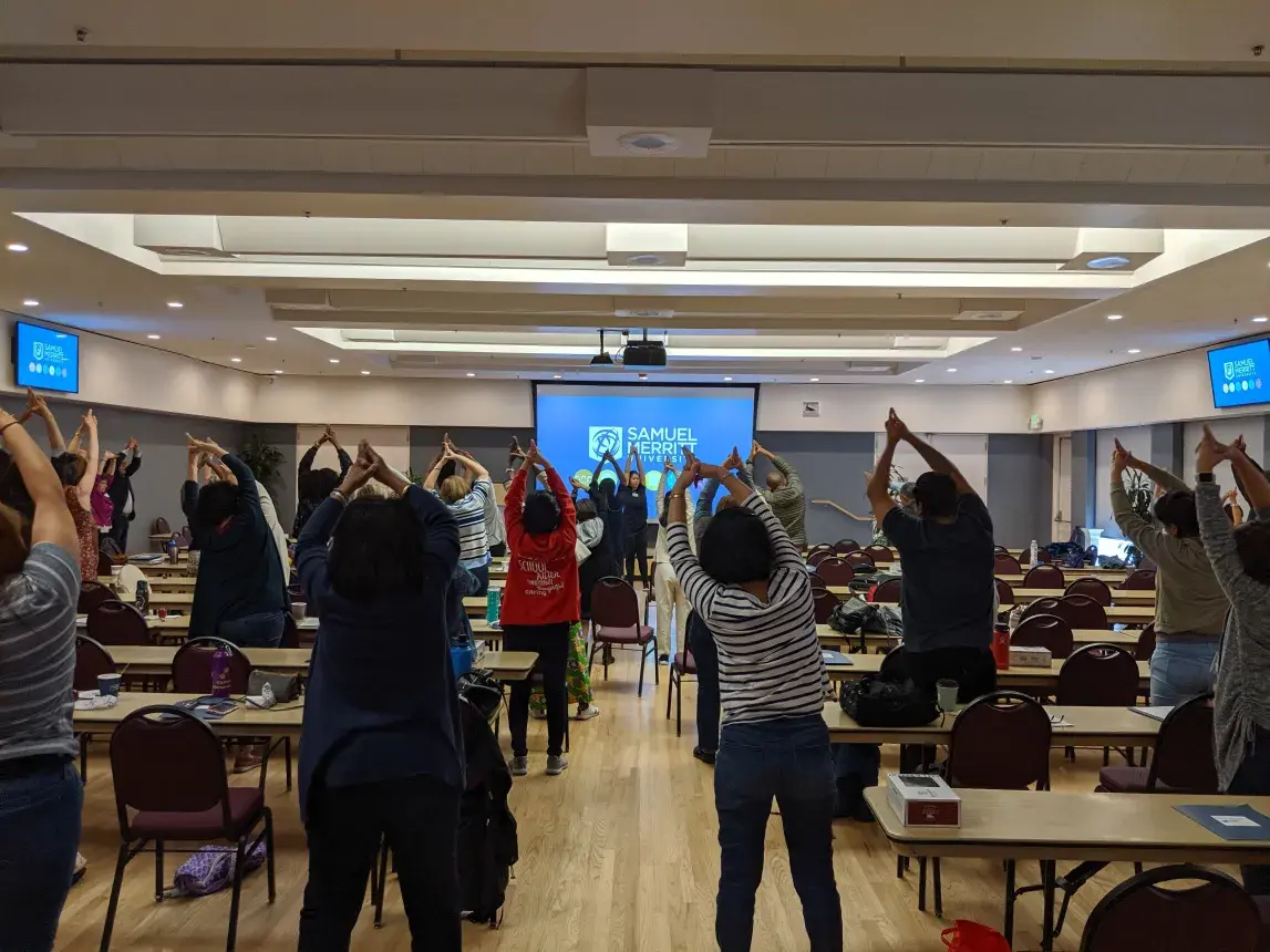 Participants practice Yoga poses