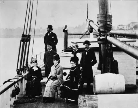 Merritt family on the deck of a boat.