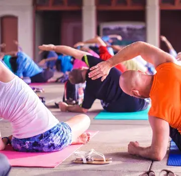 Adults doing yoga