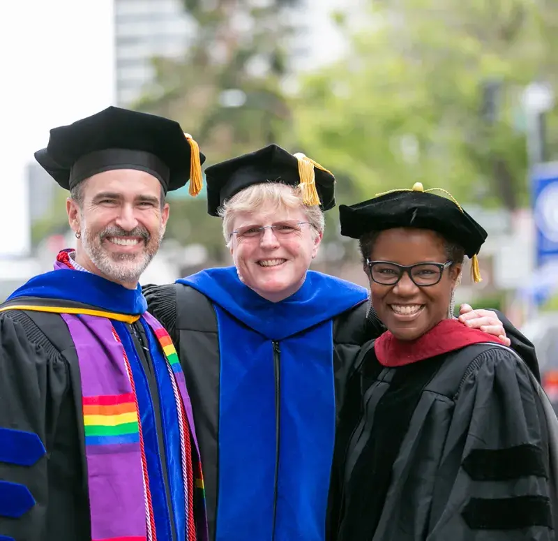 Staff and faculty at commencement 960x930