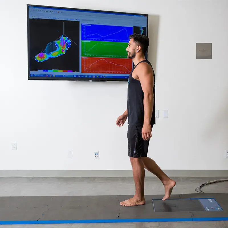 Student walking in lab