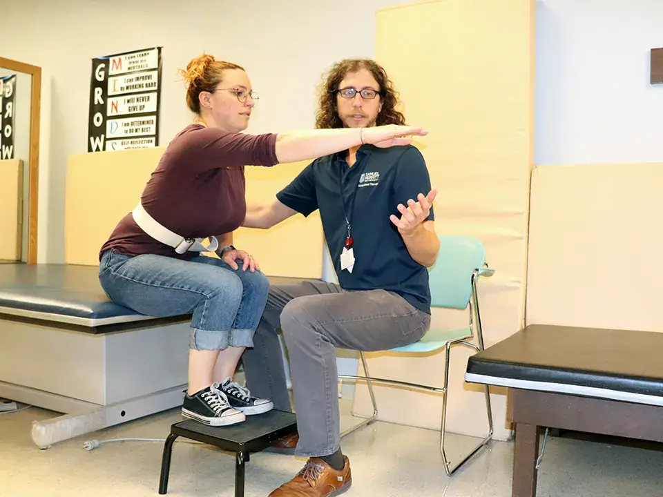 Daniel Jolles with young female patient 