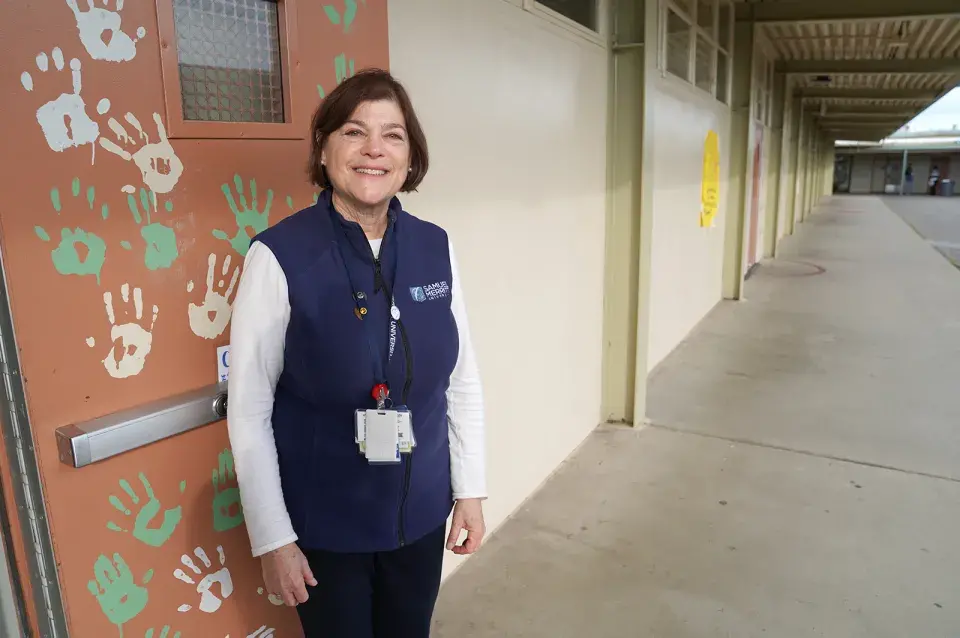 Instructor in front of door 